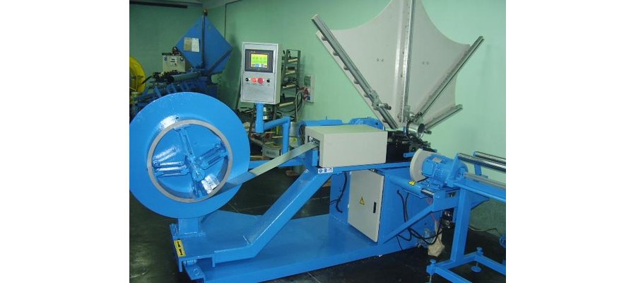Maszyna do produkcji okrągłych kanałów wentylacyjnych spiro - zdjęcie