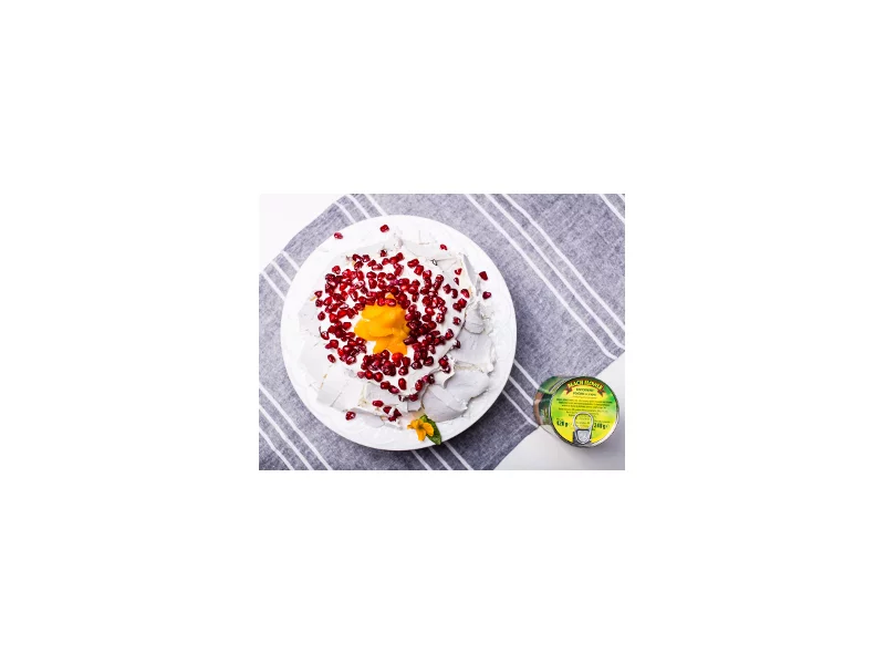 Pavlova z brzoskwiniami i granatem zdjęcie