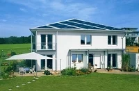 Dom pasywny z oknami i korektorami słonecznymi Schüco Fot. Schüco