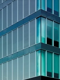 Fasada elementowa wieżowca Brillux ze zintegrowaną ochroną przeciwsłoneczną Schüco CTB, Schüco