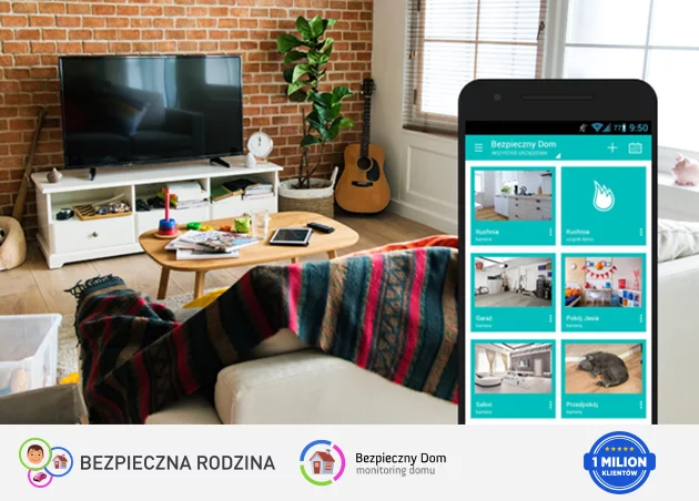 widok aplikacji bezpieczny dom na smartfonie w tle telewizor i gitara