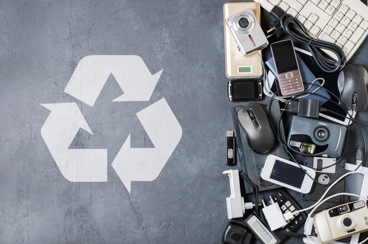 old electronic devices dark background concept recycling disposal electronic waste