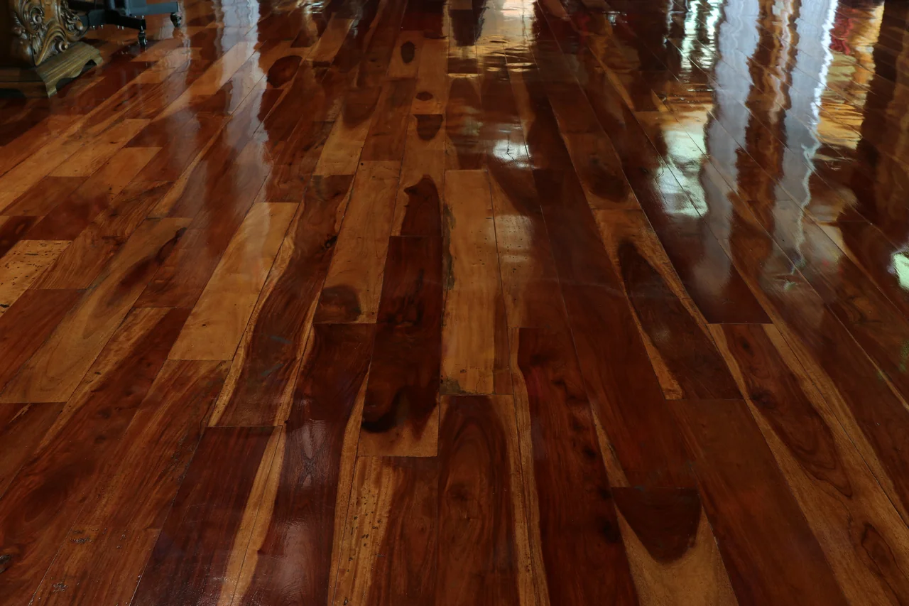 brown hardwood floors with shiny lacquered finish